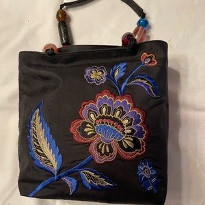 Black silk embroidered bag. Never used.